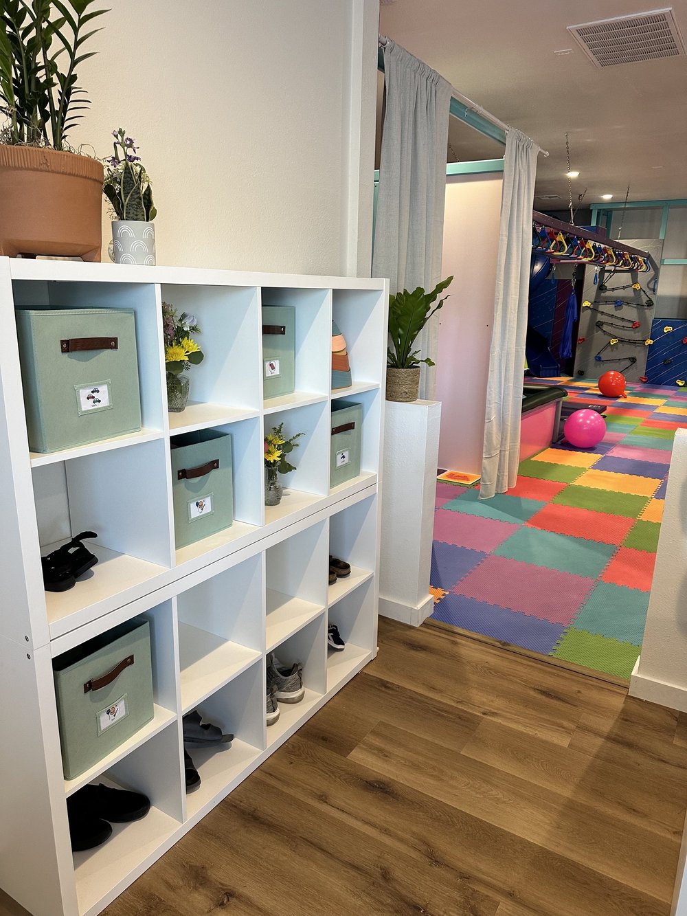Cubbies at The Grove entrance leading into the colorful play gym